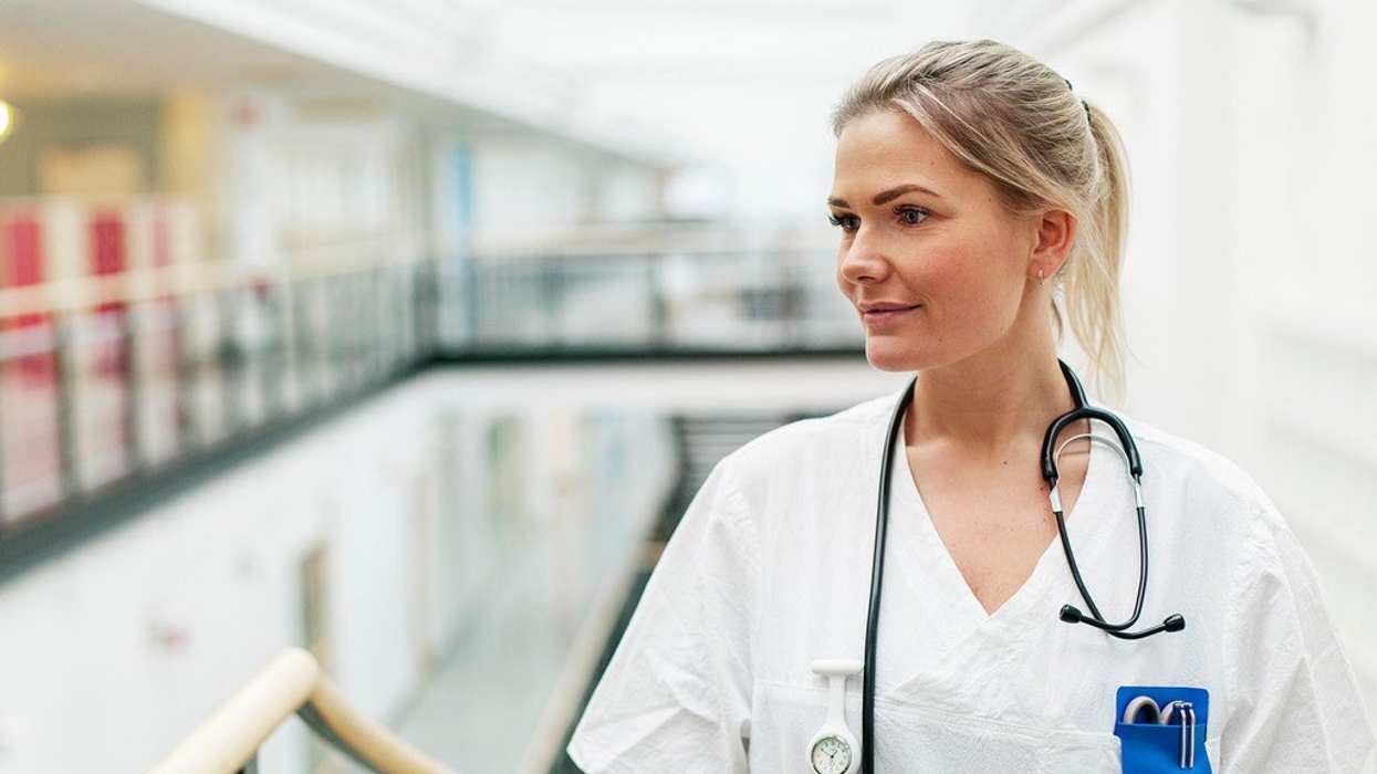 Female doctor in hospital setting.