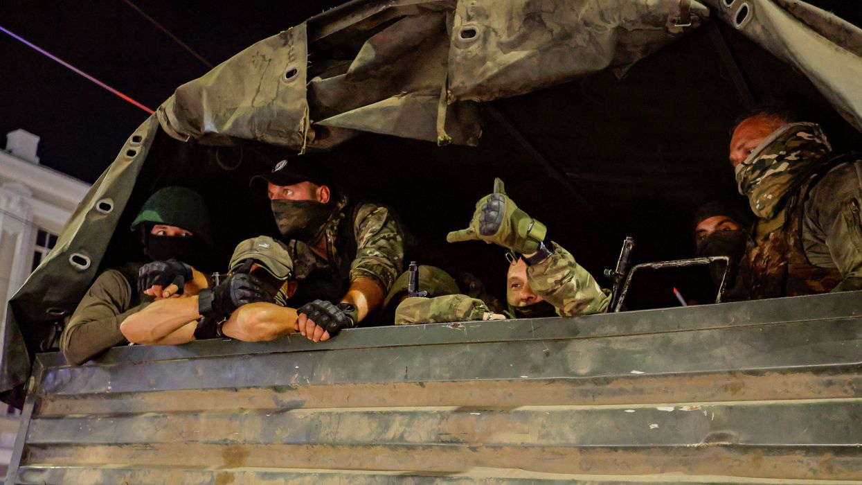 Fighters of Wagner private mercenary group pull out of the headquarters of the Southern Military District in the city of Rostov-on-Don, Russia.