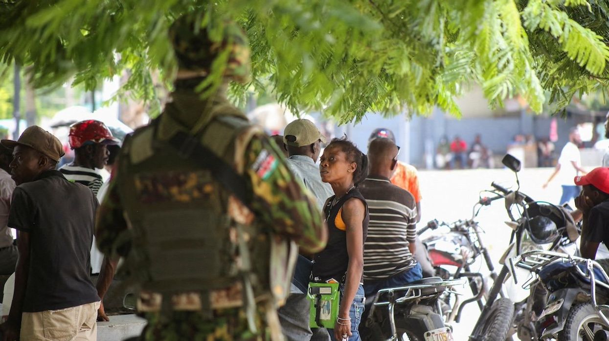 FILE PHOTO: A Kenyan police officer stands guard during a joint operation with Haitian police, in Port-au-Prince, Haiti July 29, 2024.