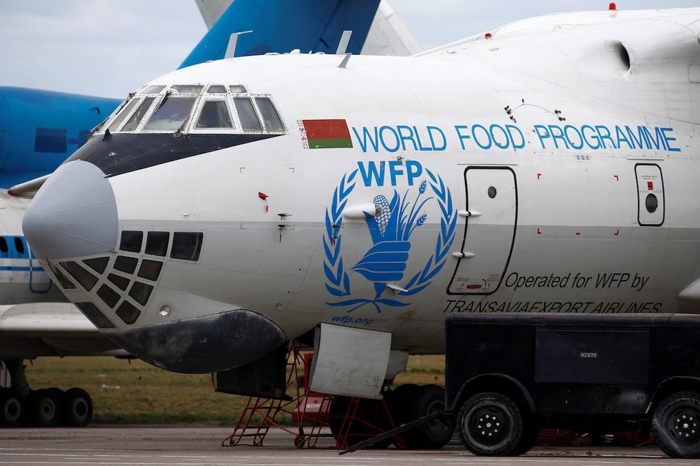 FILE PHOTO: A logo of the World Food Programme humanitarian organization is seen on a plane at the National Airport Minsk, Belarus April 19, 2018.