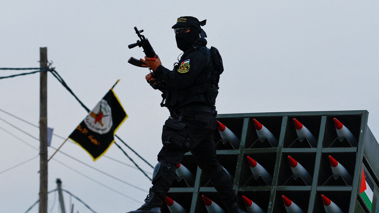 FILE PHOTO: A Palestinian Islamic Jihad militant participates in an anti-Israel military parade marking the 36th anniversary of the movement's foundation in Gaza City, October 4, 2023.