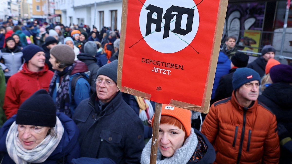 FILE PHOTO: A placard reads, "deport AFD now", during nationwide protests against racism and plans of Germany's far-right Alternative for Germany (AFD) party to deport foreigners, in Bonn, Germany, January 21, 2024.