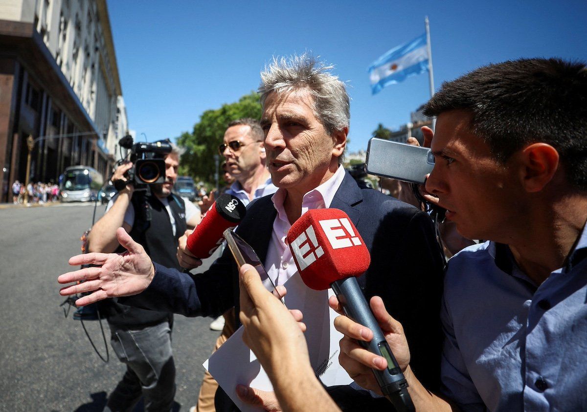 FILE PHOTO: Argentina's Minister of Economy Luis Caputo speaks to the press, one day after the inauguration of Argentina's President Javier Milei, in Buenos Aires, Argentina, December 11, 2023.
