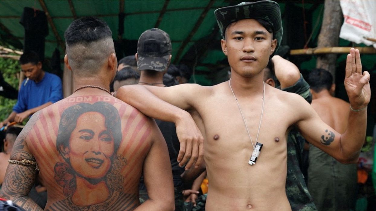 FILE PHOTO: At a secret jungle camp in Myanmar's eastern Karen state, a fitness coach and other civilians are training with armed ethnic guerrillas to fight back against the country's military takeover.