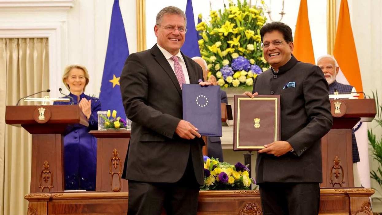 FILE PHOTO: European Commissioner for Trade Maros Sefcovic and India's Trade Minister Piyush Goyal pose after signing an agreement, as European Commission President Ursula von der Leyen, Indian Prime Minister Narendra Modi and European Council President Antonio Costa stand behind them, at the Hyderabad House in New Delhi, India, January 27, 2026.