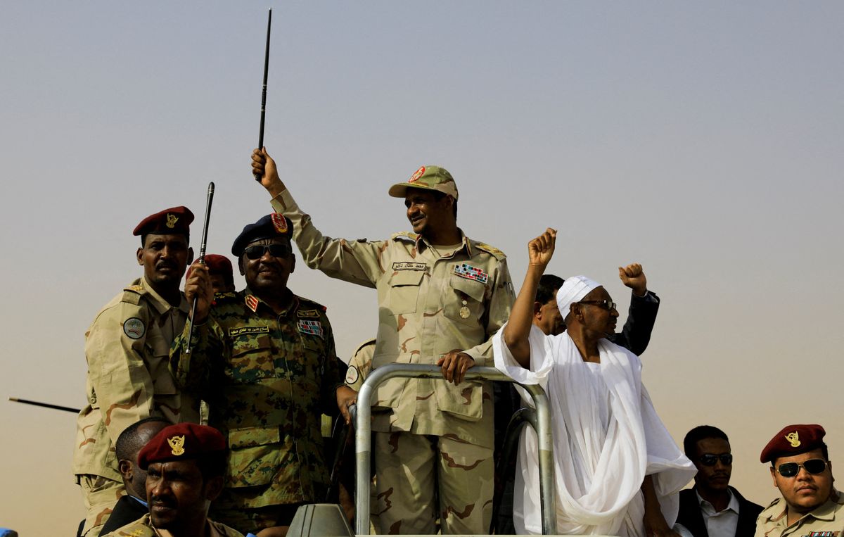 FILE PHOTO: Lieutenant General Mohamed Hamdan Dagalo, deputy head of the military council and head of paramilitary Rapid Support Forces (RSF), greets his supporters as he arrives at a meeting in Aprag village, 60 kilometers away from Khartoum, Sudan, June 22, 2019.