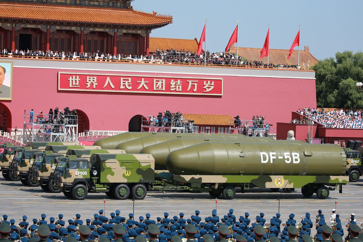 FILE PHOTO: Military vehicles carrying DF-5B liquid-fuel intercontinental ballistic missiles (ICBM) march past the Tiananmen Rostrum during the military parade to commemorate the 70th anniversary of the victory in the Chinese People's War of Resistance Against Japanese Aggression in Beijing, China, 3 September 2015.