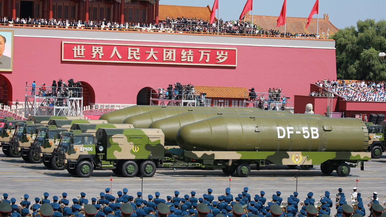 FILE PHOTO: Military vehicles carrying DF-5B liquid-fuel intercontinental ballistic missiles (ICBM) march past the Tiananmen Rostrum during the military parade to commemorate the 70th anniversary of the victory in the Chinese People's War of Resistance Against Japanese Aggression in Beijing, China, 3 September 2015.