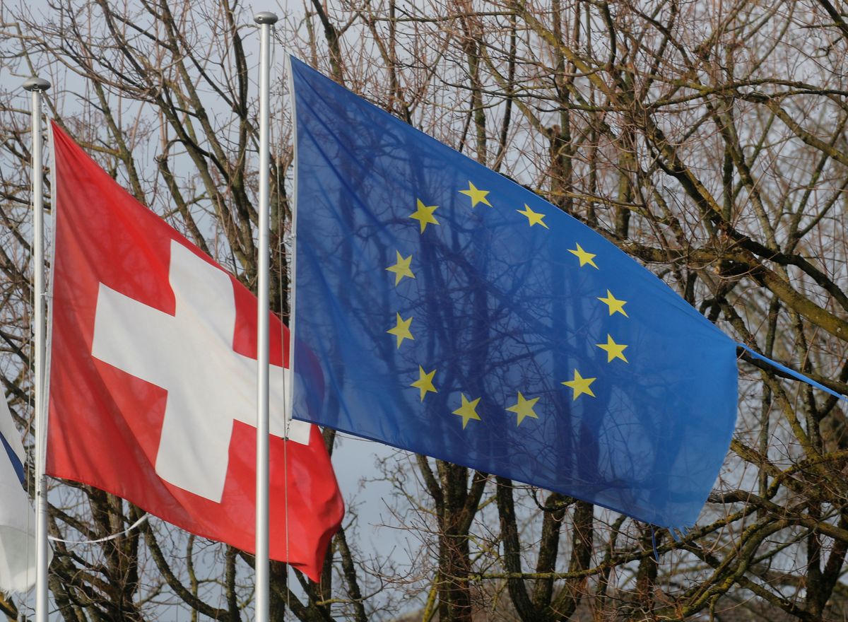 File photo of Swiss and EU flags. Reuters