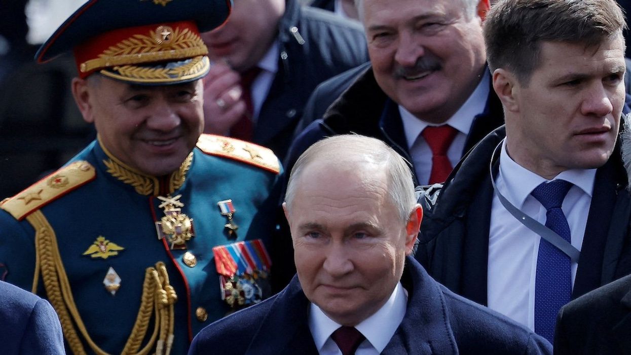 FILE PHOTO: Participants, including Russian President Vladimir Putin, Defence Minister Sergei Shoigu and Belarusian President Alexander Lukashenko, attend a military parade on Victory Day, which marks the 79th anniversary of the victory over Nazi Germany in World War Two, in Red Square in Moscow, Russia, May 9, 2024.