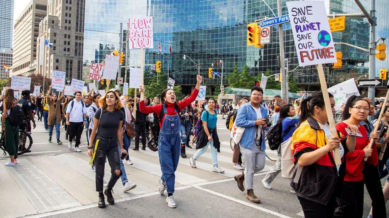 FILE PHOTO: People take part in a climate change strike in Toronto, Ontario, Canada September 27, 2019.