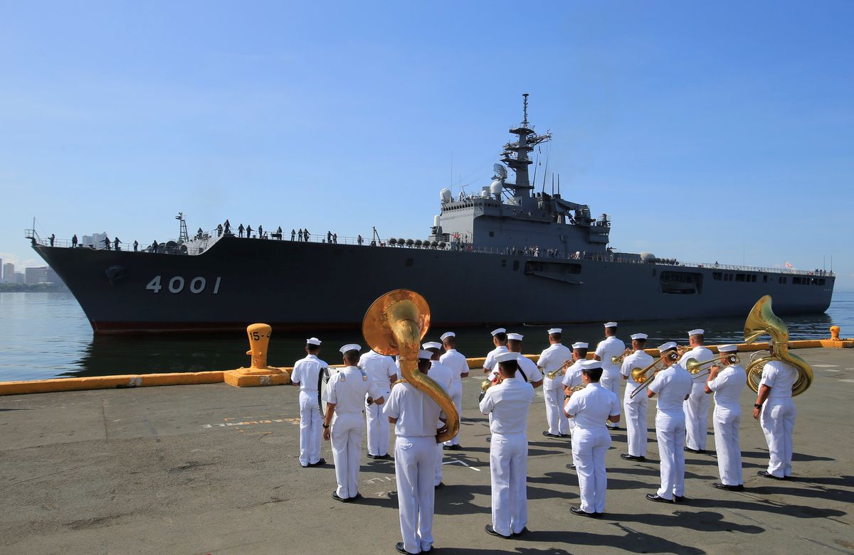 FILE PHOTO: Philippine Navy welcomes the arrival of Japanese Maritime Self-Defence Force ship for a two-day goodwill visit upon its arrival at the South Harbor in Metro Manila, Philippines April 26, 2018.