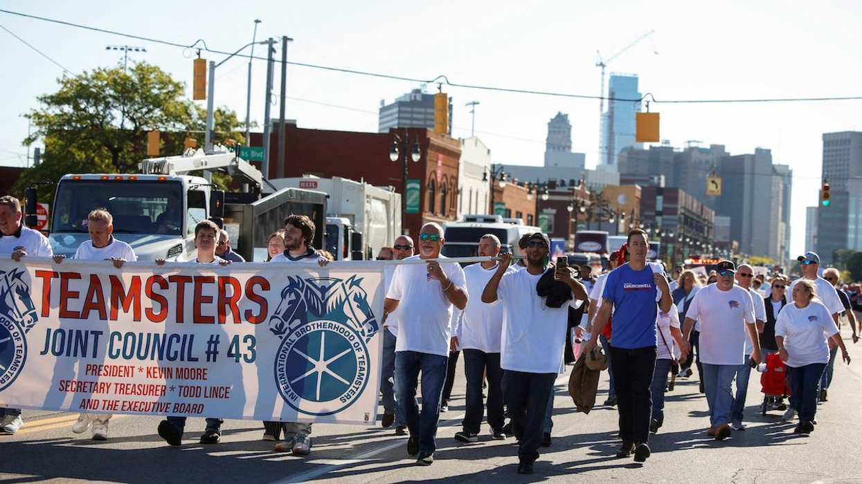 FILE PHOTO: Teamsters union members march in the annual Labor Day Parade in Detroit, Michigan, U.S., September 2, 2024.