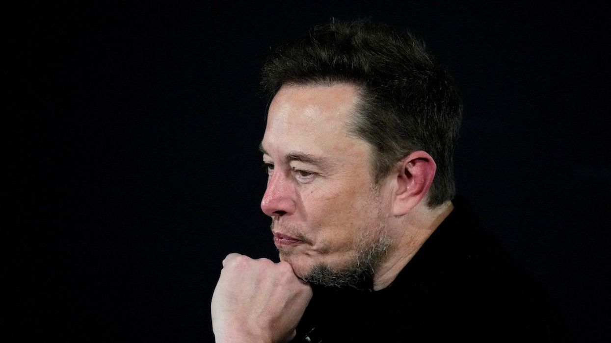 FILE PHOTO: Tesla and SpaceX's CEO Elon Musk pauses during an in-conversation event with British Prime Minister Rishi Sunak in London, Britain, Thursday, Nov. 2, 2023.
