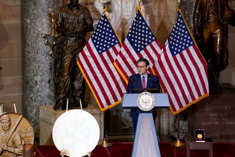 File Photo: ​U.S. House Speaker Mike Johnson (R-LA) speaks during a Congressional Gold Medal ceremony posthumously honoring Major League Baseball player, civil rights activist and World War II veteran, Lawrence Eugene “Larry” Doby, in Statuary Hall at the U.S. Capitol in Washington, U.S., December 13, 2023. 