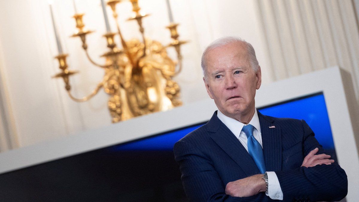 ​FILE PHOTO: U.S. President Joe Biden looks on before speaking during a roundtable discussion on public safety at the State Dining Room at the White House in Washington, U.S., February 28, 2024. 