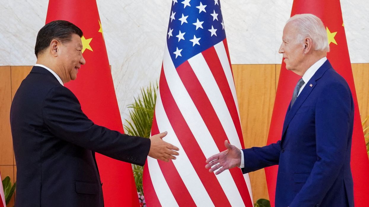 FILE PHOTO: U.S. President Joe Biden meets with Chinese President Xi Jinping on the sidelines of the G20 leaders' summit in Bali, Indonesia, November 14, 2022.