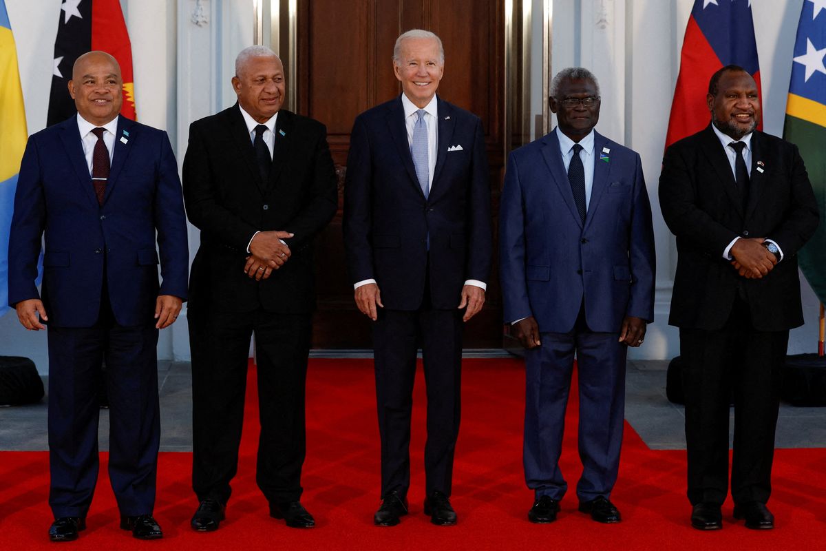 FILE PHOTO: U.S. President Joe Biden poses with Federated States of Micronesia's President David Panuelo, Fiji's Prime Minister Frank Bainimarama, Solomon Islands Prime Minister Manasseh Sogavare and Papua New Guinea's Prime Minister James Marape and other leaders from the U.S.- Pacific Island Country Summit (not pictured), at the White House in Washington, U.S. September 29, 2022.