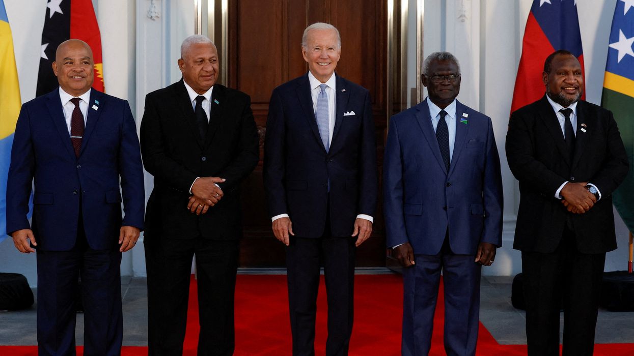 FILE PHOTO: U.S. President Joe Biden poses with Federated States of Micronesia's President David Panuelo, Fiji's Prime Minister Frank Bainimarama, Solomon Islands Prime Minister Manasseh Sogavare and Papua New Guinea's Prime Minister James Marape and other leaders from the U.S.- Pacific Island Country Summit (not pictured), at the White House in Washington, U.S. September 29, 2022.