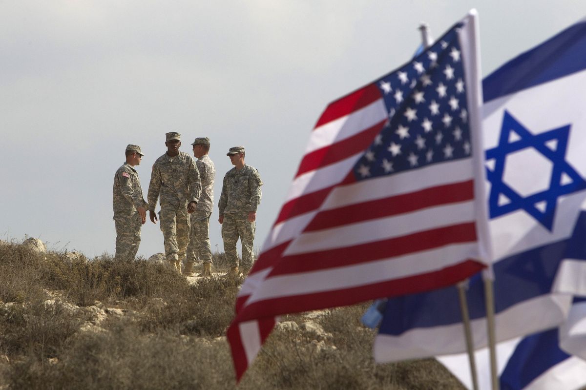 File Photo: U.S. soldiers stand next to a Patriot anti-missile battery (not seen) west of Jerusalem, during "Austere Challenge 2012", a joint Israeli-hosted exercise October 23, 2012.
