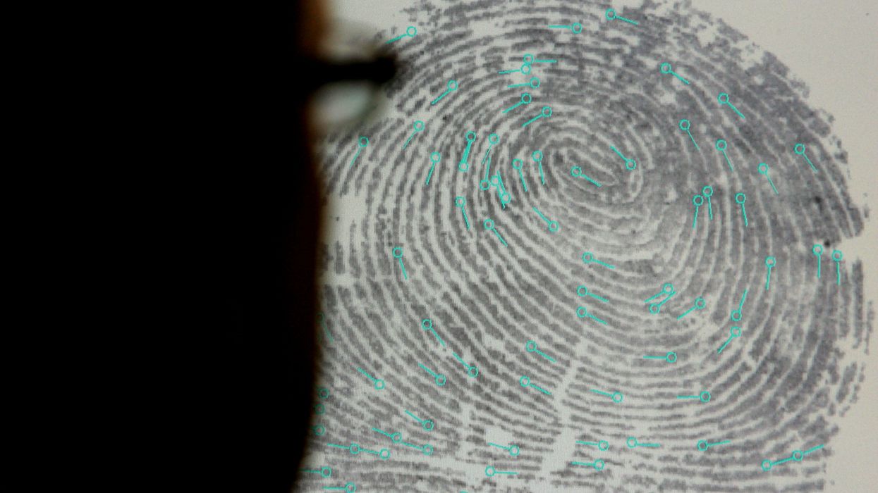 Fingerprint and loupe.