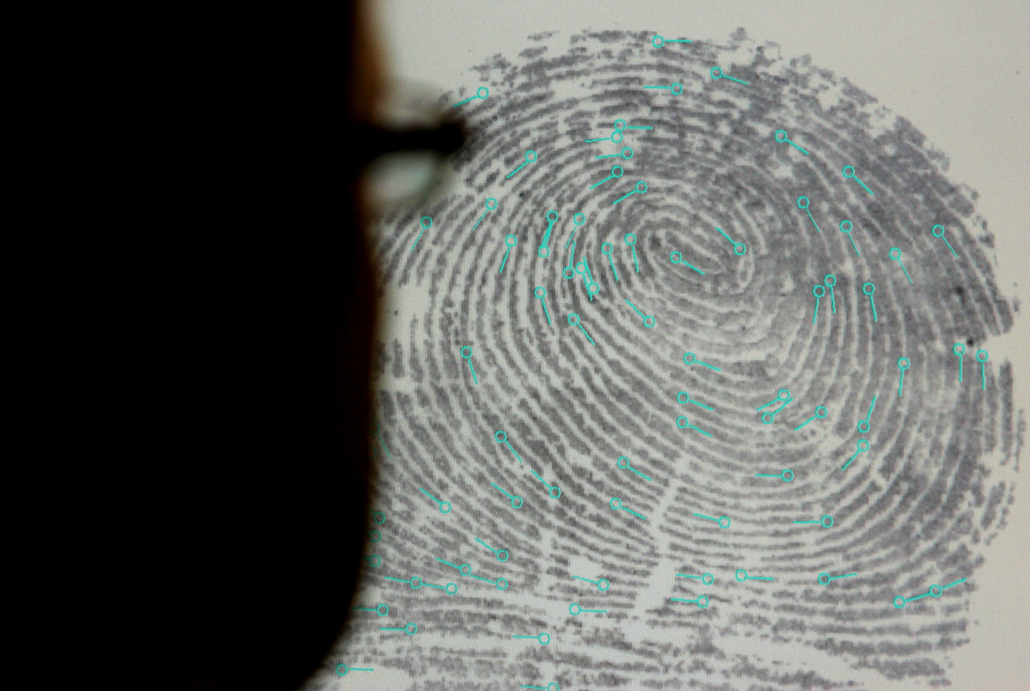 Fingerprint and loupe.