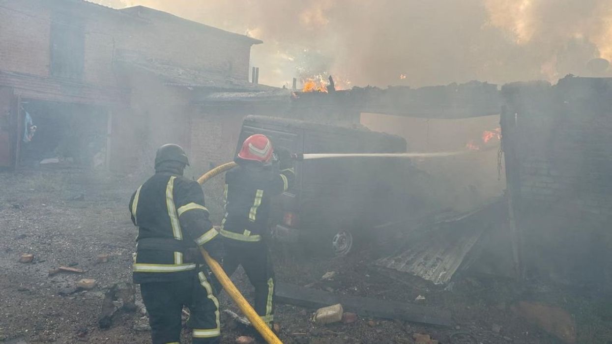Firefighters work at the site of destroyed garages following a Russian drone and missile strikes in Khmelnytskyi, Ukraine, on September 3, 2025.