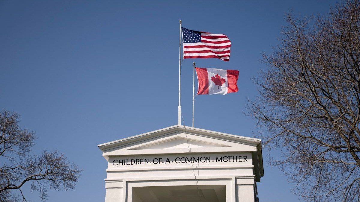 ​Flags fly above the Peace Arch at a Canada-US border crossing in Blaine, Washington, USA, on April 2, 2025.