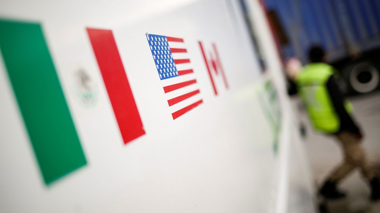 Flags of Mexico, United States, and Canada are pictured at a security booth at Zaragoza-Ysleta border crossing bridge in Ciudad Juarez.