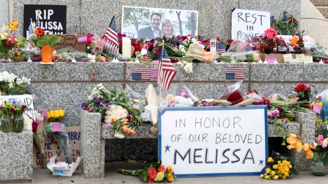 Flowers and hand-written messages sit at a memorial outside the Minnesota State Capitol in honor of Democratic state assemblywoman Melissa Hortman and her husband Mark.