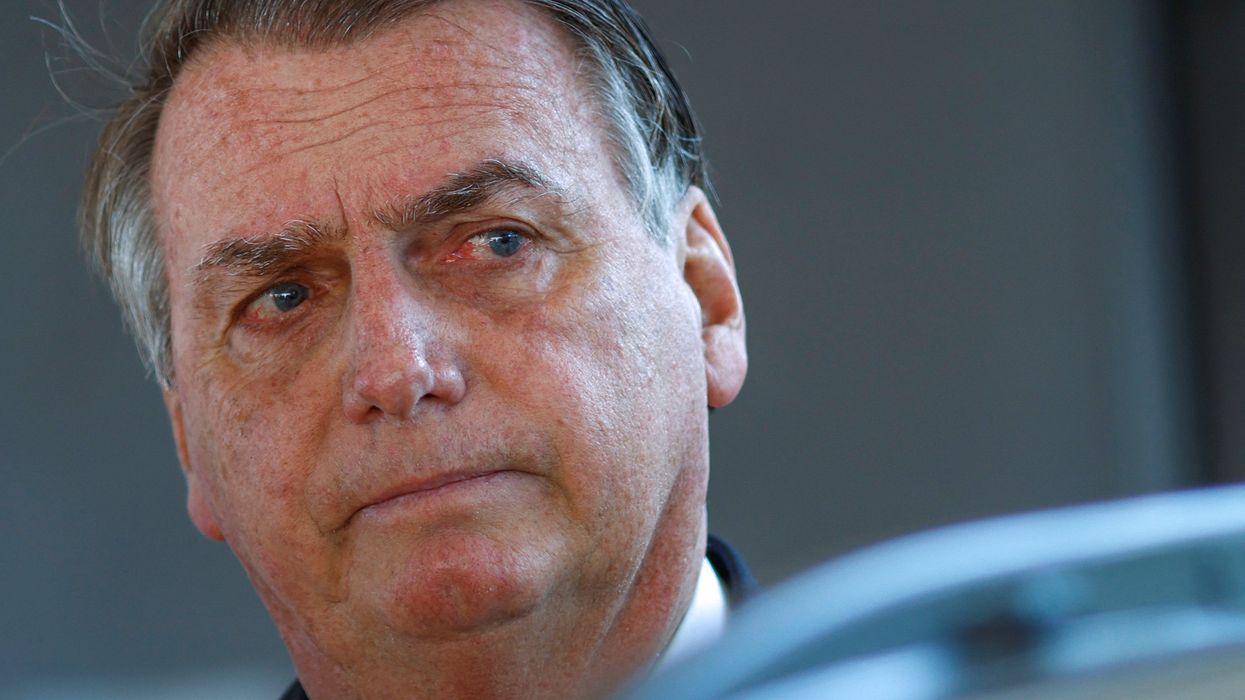 Former Brazilian President Jair Bolsonaro leaves his home following a search operation in Brasilia.