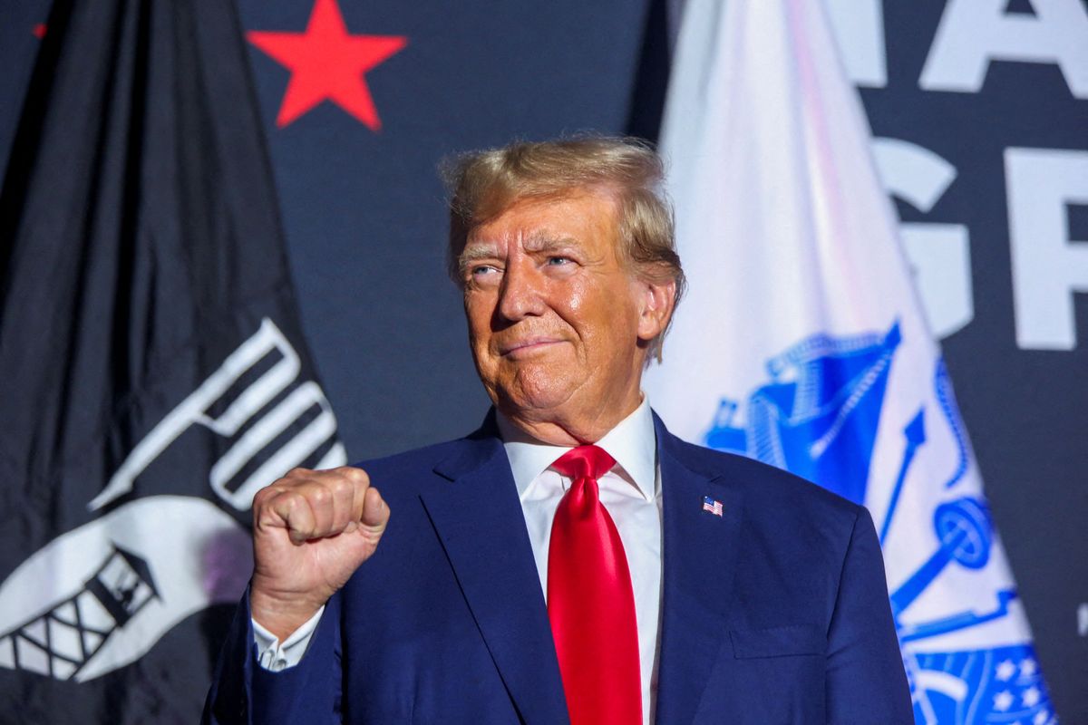 Former President and Republican candidate Donald Trump greets the crowd during a campaign rally in Windham, New Hampshire, on Aug. 8, 2023. ​