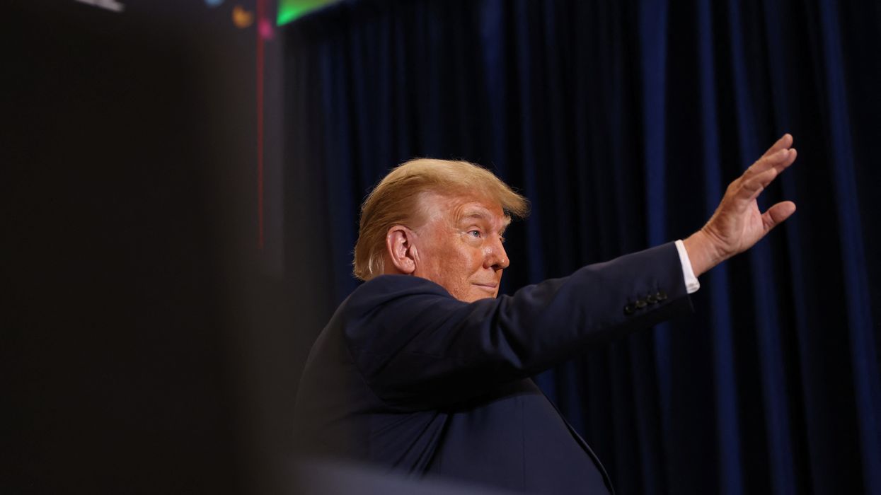 Former President Donald Trump attends a campaign event in Waterloo, Iowa, on Dec. 19, 2023.