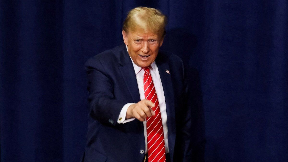 Former President Donald Trump gestures to supporters as he hosts a campaign rally at the Forum River Center in Rome, Georgia, March 9, 2024.