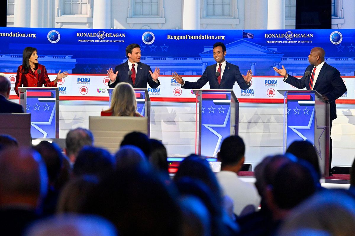 Former South Carolina Gov. Nikki Haley, Florida Gov. Ron DeSantis, businessman Vivek Ramaswamy and South Carolina Sen. Tim Scott speak during the FOX Business Republican presidential primary debate at the Ronald Reagan Presidential Library and Museum.