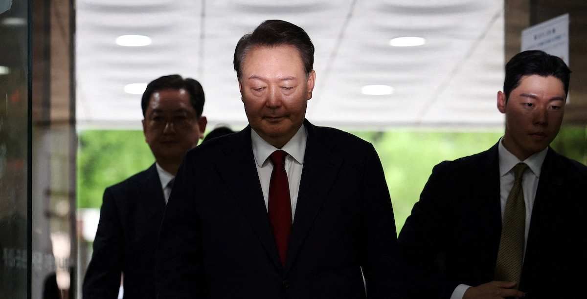 ​Former South Korean President Yoon Suk Yeol arrives at a court to attend a hearing to review his arrest warrant requested by special prosecutors in Seoul, South Korea, July 9, 2025. 