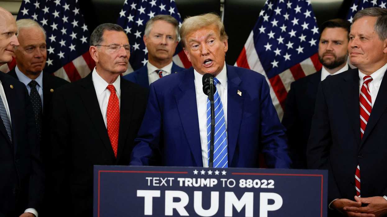 Former U.S. President and Republican presidential candidate Donald Trump speaks to the media following meetings with Republicans on Capitol Hill, at the National Republican Senatorial Committee (NRSC) headquarters in Washington, U.S., June 13, 2024.