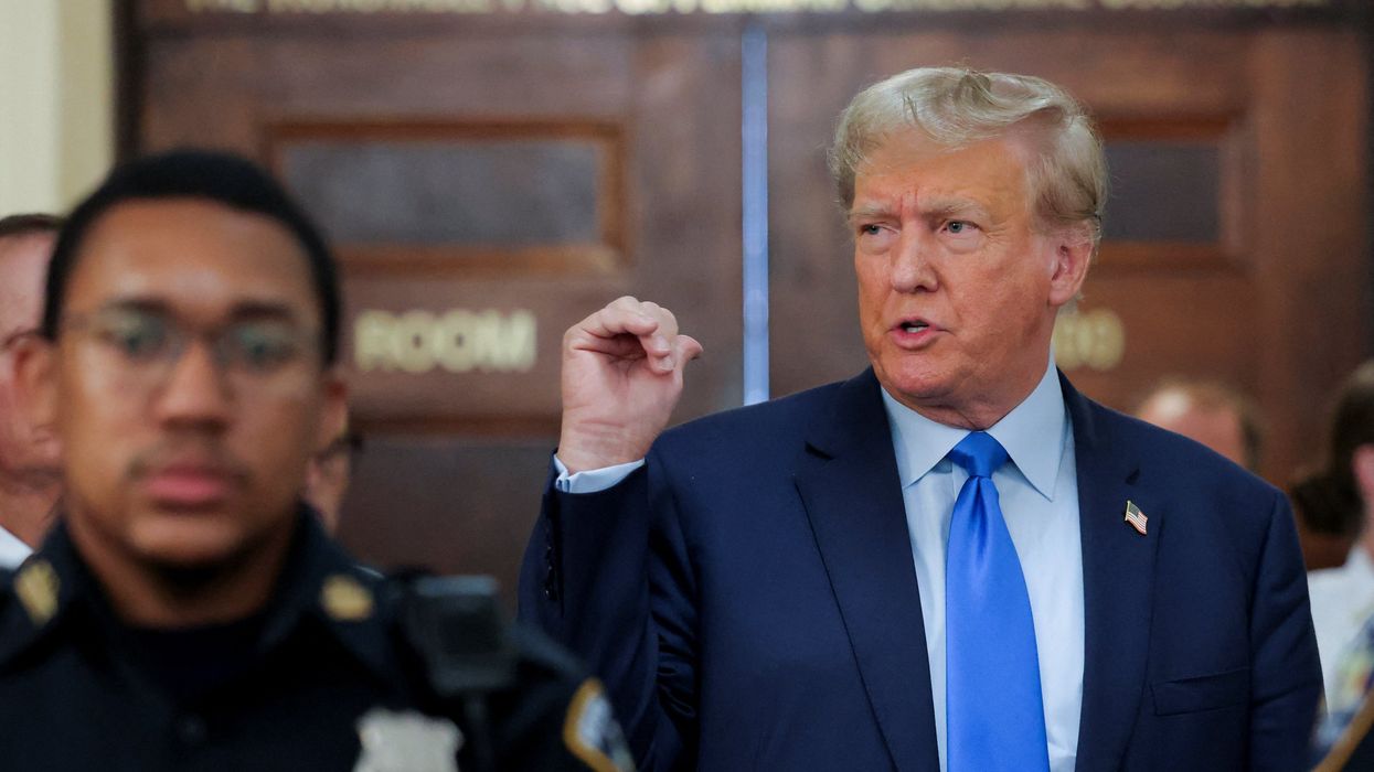 Former U.S. President Donald Trump gestures as he makes a statement to the media outside the court room at a Manhattan courthouse, during the trial of himself, his adult sons, the Trump Organization and others in a civil fraud case brought by state Attorney General Letitia James, in New York City, U.S., October 2, 2023.