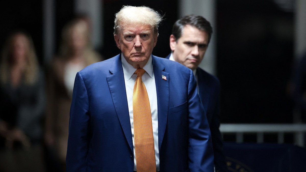 ​Former U.S. President Donald Trump walks amid his trial for allegedly covering up hush money payments, at Manhattan Criminal Court on May 7, 2024, in New York City, U.S. Trump has been charged with 34 counts of falsifying business records, which prosecutors say was an effort to hide a potential sex scandal, both before and after the 2016 presidential election. Trump is the first former U.S. president to face trial on criminal charges. 
