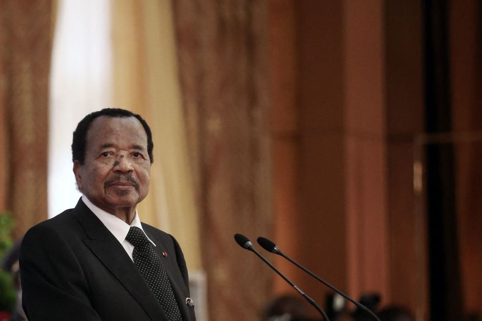 France's President and Cameroon's President Paul Biya take part in a joint press conference at The Presidential Palace in Yaounde, Cameroon on July 26, 2022.