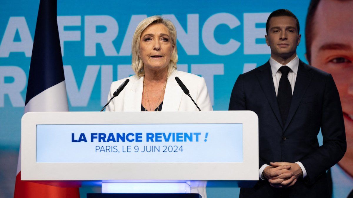 ​French far-right Rassemblement National (RN) party leader Marine Le Pen and party President Jordan Bardella address militants listens after French President announced he is calling for new general elections on June 30, during an evening gathering on the final day of the European Parliament election, at the Pavillon Chesnaie du Roy in Paris, on June 9, 2024. 