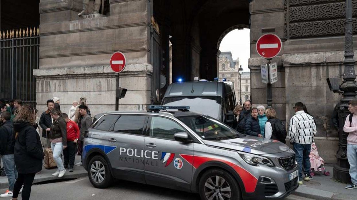 French police officers seal off the entrance to the Louvre Museum after a robbery in Paris, France, on October 19, 2025. Robbers break into the Louvre and flee with jewelry on the morning of October 19, 2025, a source close to the case says, adding that its value is still being evaluated. A police source says an unknown number of thieves arrive on a scooter armed with small chainsaws and use a goods lift to reach the room they are targeting.