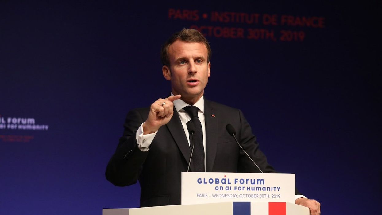 French President Emmanuel Macron delivers a speech during the Global Forum on Artificial Intelligence for Humanity (GFAIH) at the Institut de France in Paris, France October 30, 2019.