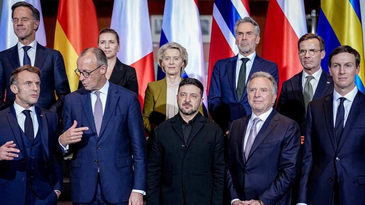 French President Emmanuel Macron, German Chancellor Friedrich Merz, Ukrainian President Volodymyr Zelenskiy, U.S. Special Envoy Steve Witkoff and businessman Jared Kushner, along with NATO Secretary-General Mark Rutte and otherEuropean leaders, pose for a group photo at the Chancellery in Berlin, Germany, December 15, 2025.