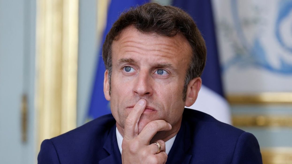 French President Emmanuel Macron takes part in an expanded videoconference in Paris, France, April 19, 2022.