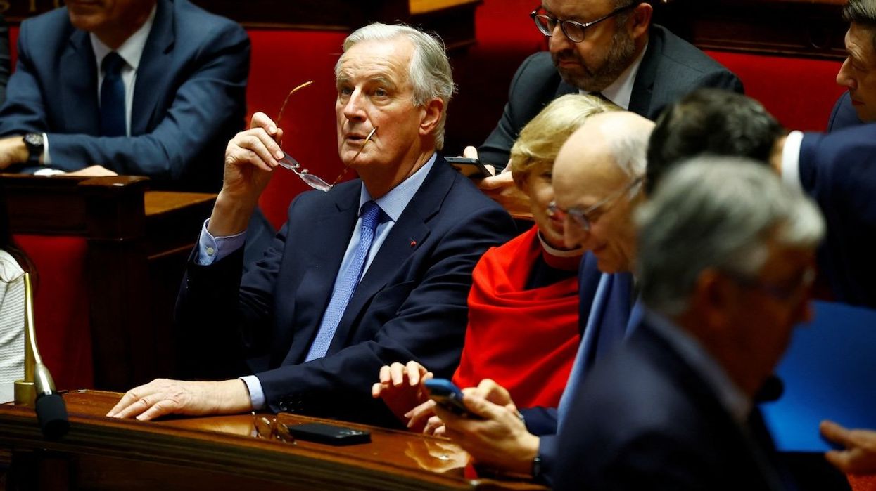 French Prime Minister Michel Barnier reacts during the result of the vote on the first motion of no-confidence against the French government, in Paris, France, on Dec. 4, 2024.