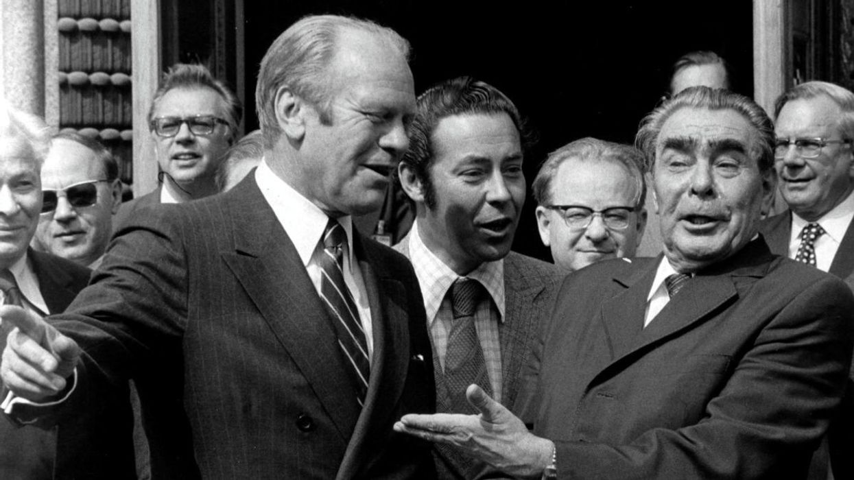 Gerald Ford American President and Leonid Brejnev Soviet Leader, on July 30, 1975 at Conference on Security and Cooperation in Helsinki.