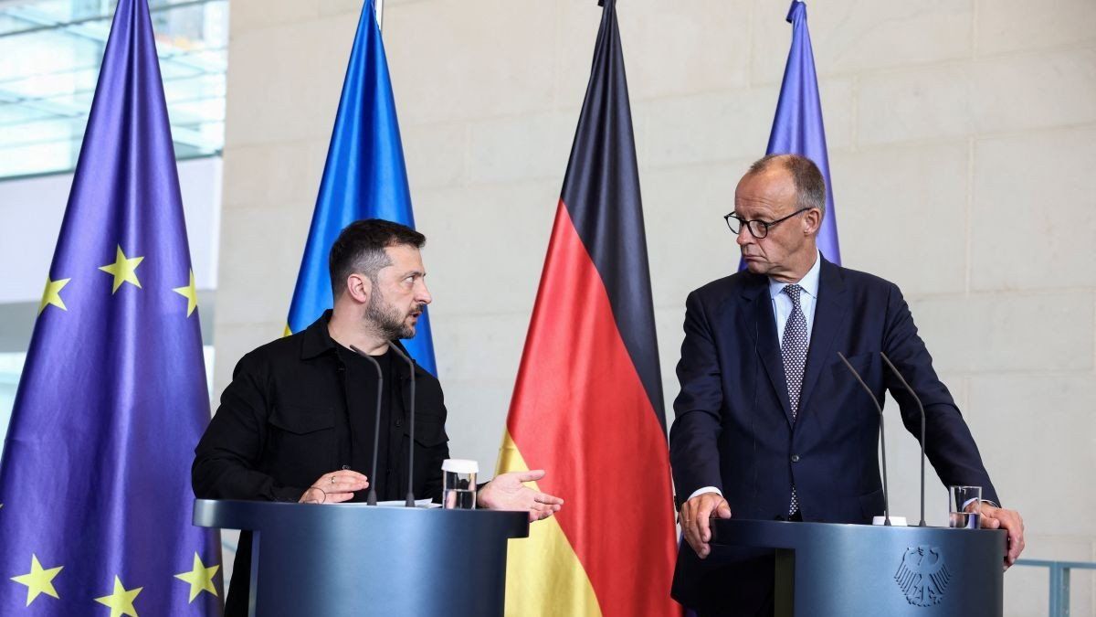 ​German Chancellor Friedrich Merz and Ukrainian President Volodymyr Zelenskiy attend a press conference, on the day they attend a virtual meeting with U.S. President Donald Trump and European leaders on the upcoming Trump-Putin summit on Ukraine, in Berlin, Germany, August 13, 2025. 