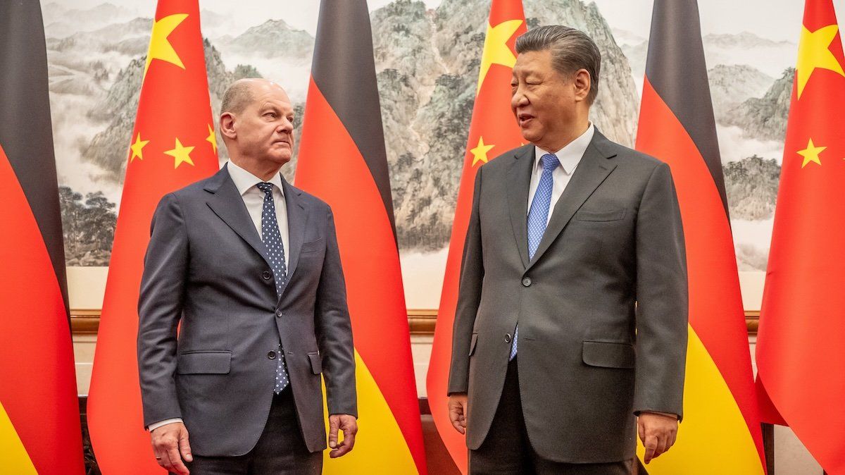 German Chancellor Olaf Scholz is received by Chinese President Xi Jinping at the State Guest House.