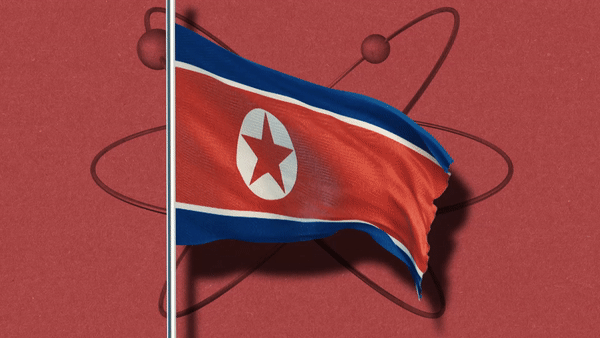Gif of a North Korean flag in front of a nuclear symbol